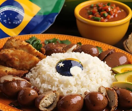 Brezilya mutfağı, tarih boyunca farklı kültürlerin etkisiyle şekillenmiş ve bugün dünya gastronomisinde özel bir yere sahip olmuştur. Yerli halkın yemek gelenekleri, Afrika’dan getirilen kölelerin mutfak alışkanlıkları ve Portekiz kolonyal döneminin etkileri birleşerek benzersiz bir mutfak kültürü ortaya çıkarmıştır. Bu çeşitlilik, Brezilya’nın geniş coğrafyasının sunduğu zengin tarım ürünleri ve deniz mahsulleriyle harmanlanmıştır. Konulu bir haber görseli.
