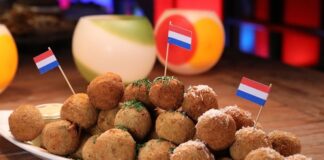 Hollanda mutfağı, sade ama doyurucu yemekleriyle tanınır ve kökenlerini ülkenin tarım, denizcilik ve ticaret geçmişinden alır. Yüzyıllar boyunca denizaşırı ticaret yolları sayesinde farklı baharatlar, sebzeler ve pişirme teknikleri Hollanda sofralarına girmiştir. Buna rağmen Hollanda yemekleri, çoğunlukla yerel malzemelere dayalı, pratik ve besleyici tariflerden oluşur. Konulu bir haber görseli.