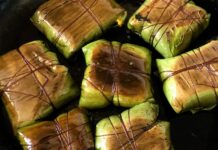 Muz yaprağında pişirme, geleneksel ve modern mutfaklarda hem sağlıklı hem de aromatik yemekler hazırlamak için kullanılan etkili bir yöntemdir. Bu teknik, yiyeceklerin kendi buharında ve aromasını kaybetmeden pişmesini sağlar. Muz yaprakları, yemekleri sarmak ve korumak için doğal bir ambalaj görevi görür; bu sayede yiyecekler hem nemini korur hem de lezzetini artırır. Konulu bir haber görseli.