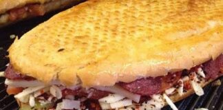 Arap tostu, Türkiye’de özellikle sokak lezzetleri arasında popülerleşmiş bir sandviç türüdür. Genellikle ince dilim ekmek, taze sebzeler, peynir ve çeşitli soslarla hazırlanır. Arap tostu, hem doyurucu hem de pratik bir öğün alternatifi olarak öne çıkar. Konulu bir haber görseli.